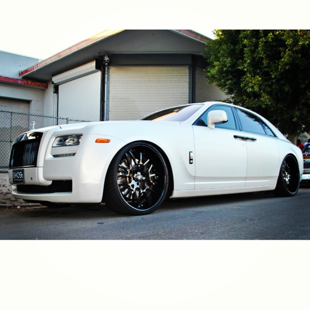 Luxury vehicle with custom wheels